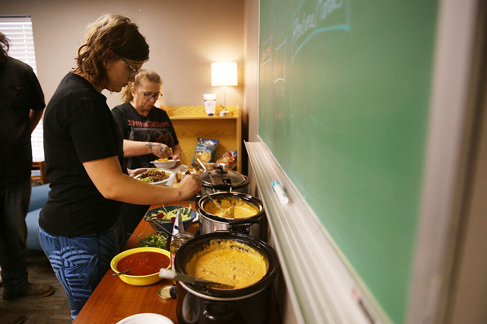 McKenzie Jacobson makes up a bowl of nachos